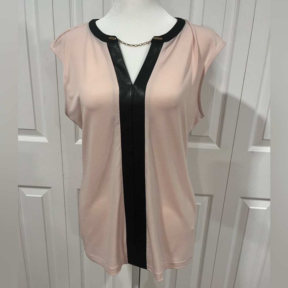 Sleeveless Calvin Klein blouse